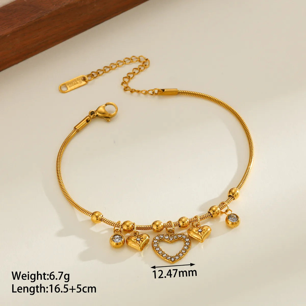 Βραχιόλι επιχρυσωμένο ατσάλι με καρδιά zircon - BR527