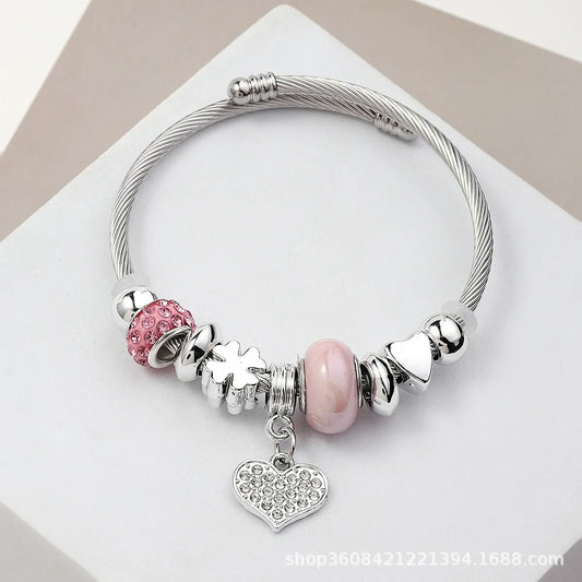 Βραχιόλι ατσάλινο bangle με καρδιές και ροζ charms -BR306
