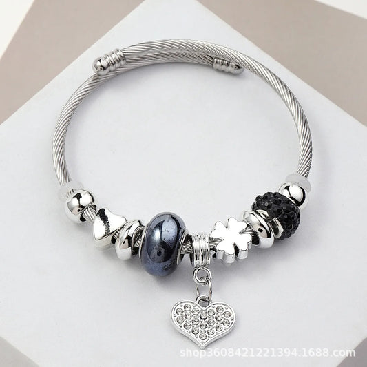 Βραχιόλι ατσάλινο bangle με καρδιές και μαύρα charms-BR307