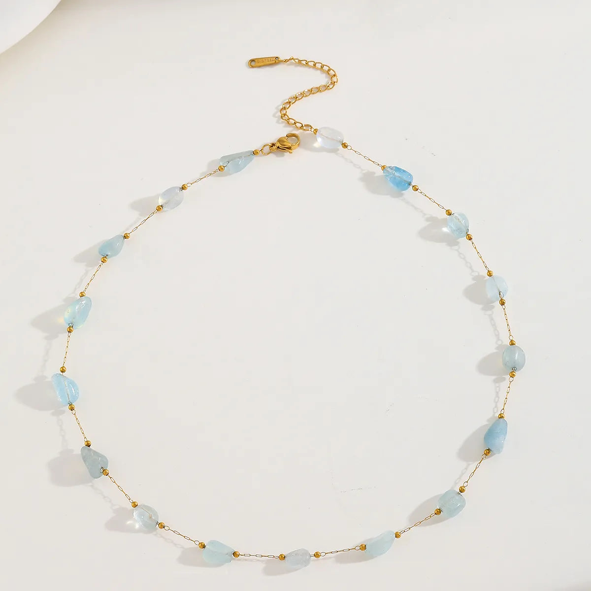 Κολιέ επιχρυσωμένο ατσάλι με γαλάζιες πέτρες - NE650