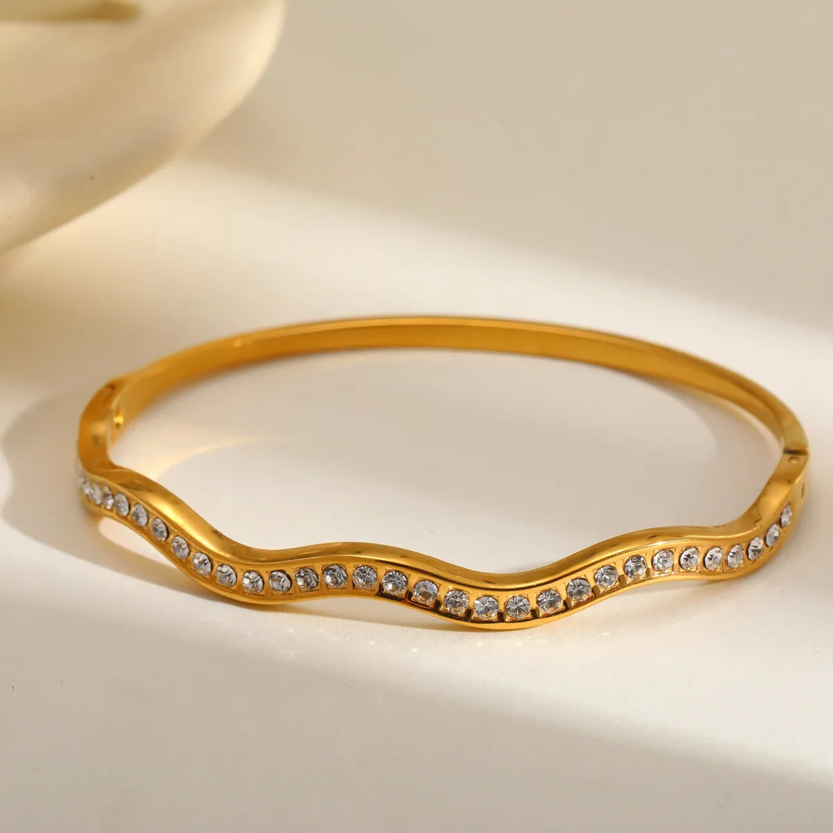Βραχιόλι επιχρυσωμένο ατσάλι κυματιστό με zircon-BR014