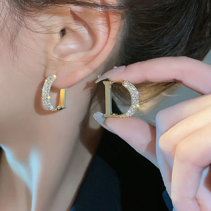 Gold plated brass earrings with zircon - ea048