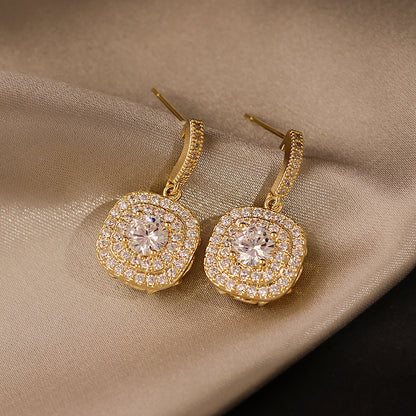 Gold dangle earrings with crystals - ea107