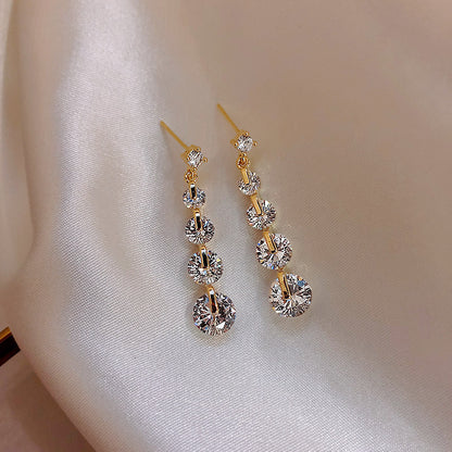 Dangle earrings with 4 circular zircons - ea114
