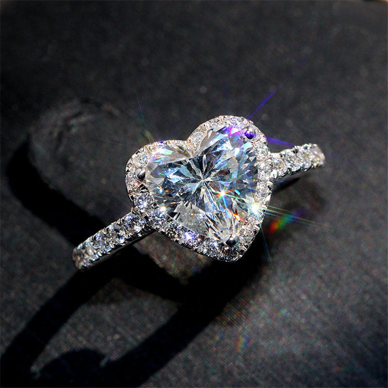Ring with heart and small zircons - R133