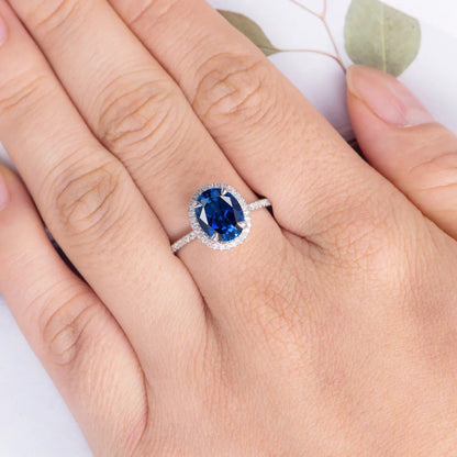 Ring with blue oval zircon - r027