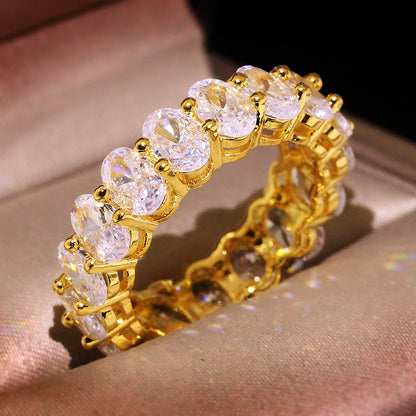 Band ring with oval zircon in gold - R075