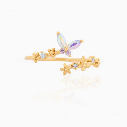 Ring with iridescent zircon butterfly - R110