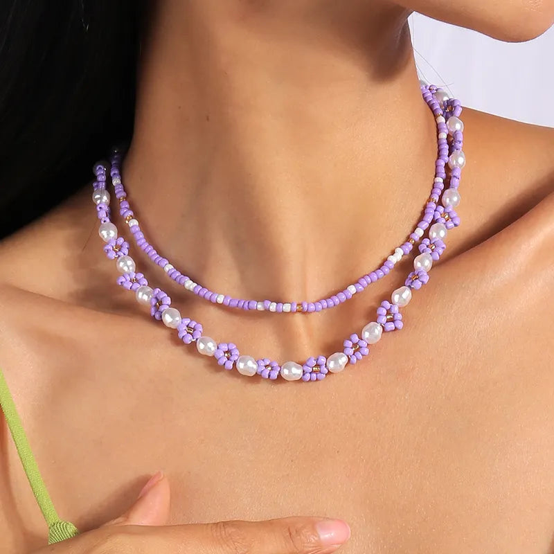 Set of 2 purple necklaces with beads and daisies - ne447