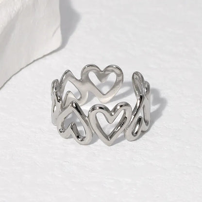 Δαχτυλίδι ατσάλινο με ασημί καρδιές - R136