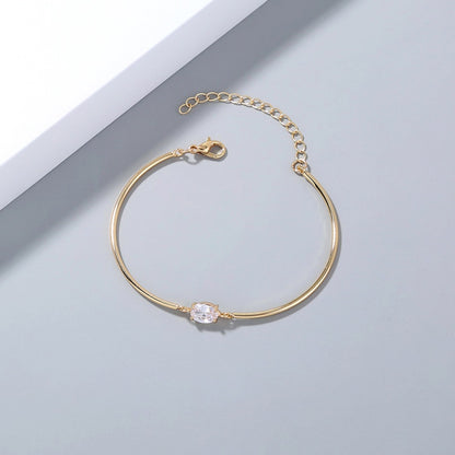 Metal bracelet with oval zircon -br035