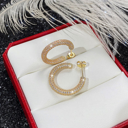 Small gold plated hoops with zircon - ea050
